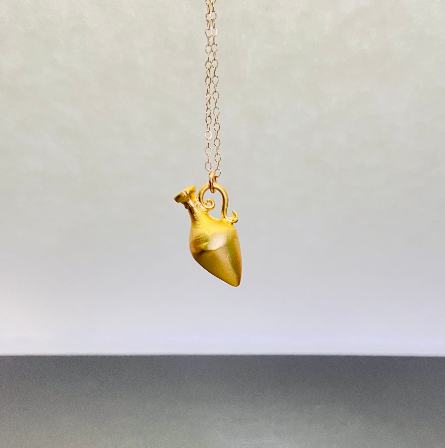 Age of Aquarius in gold + silver
