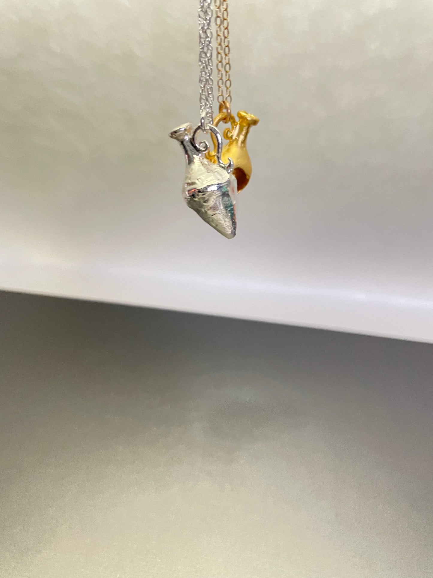 Age of Aquarius in gold + silver